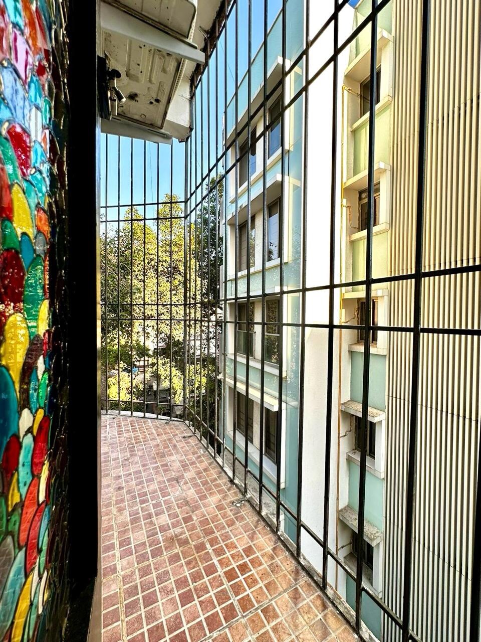 Vivid appliances and saturated furniture inside Bandra Art House