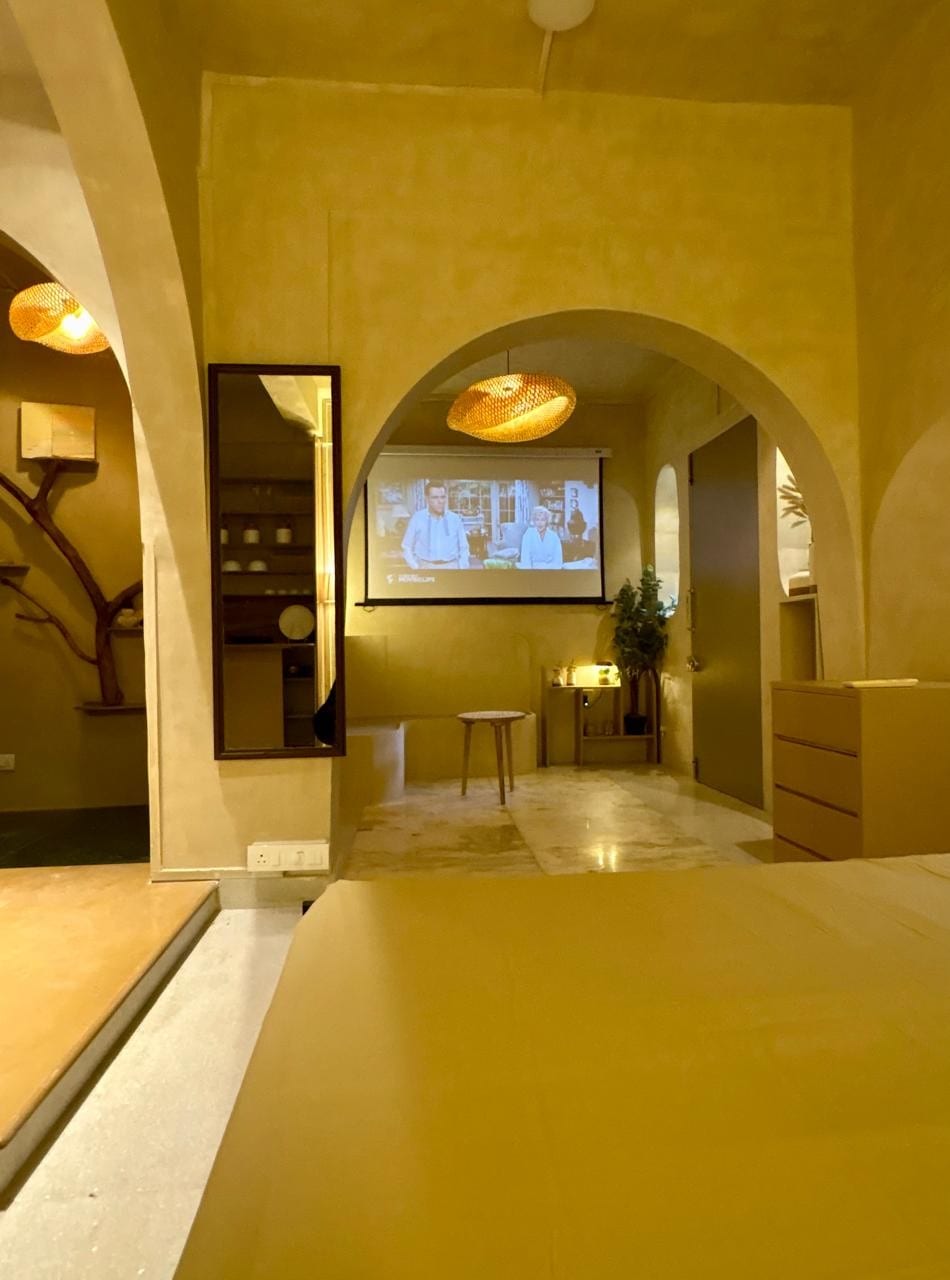 Beige Burrow's projector screen set up for a cinema night