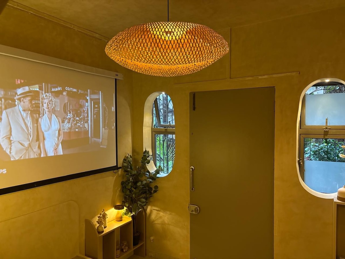 Warm golden-toned seating area inside Beige Burrow