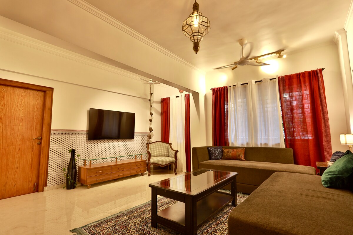 Indian craft references and timber detailing in the India House living room