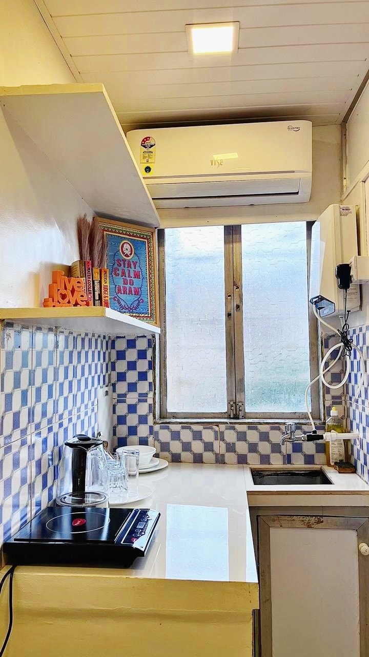 Compact kitchenette corner of the Little Bandra Studio
