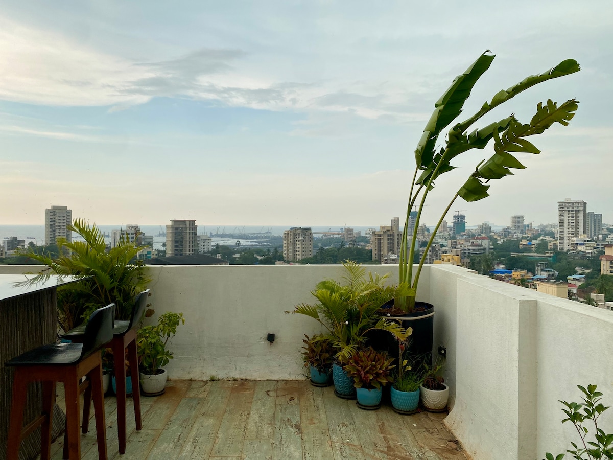 Sky Lounge private terrace with skyline and ocean views at golden hour